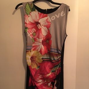 Boutique cap sleeve floral dress.